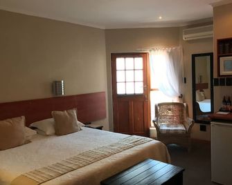 آلا مارثاز آربورت جيستهاوس - بورت إليزابيث - غرفة نوم