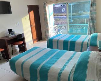 Cordiality Inn - Puebla - Camera da letto