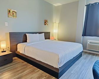 Champion Inn Motel By OYO Hwy 59 Shepherd - Shepherd - Habitación