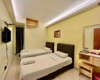 Adam Hotel - Brinchang - Slaapkamer