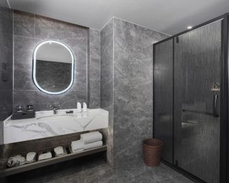 Xichang Yuehaili Wetland Hotel (Qionghai 17 Degrees Branch) - Liangshan - Schlafzimmer