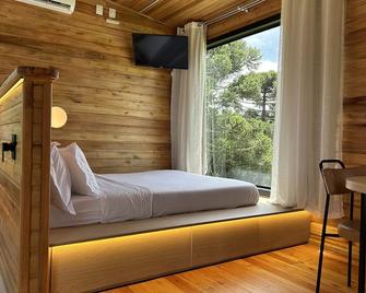 Chalés Solar da Montanha Urubici - com hidromassagem - Urubici - Bedroom