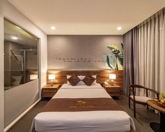 ثانه لونج هوتل - هوتشي مين سيتي - غرفة نوم