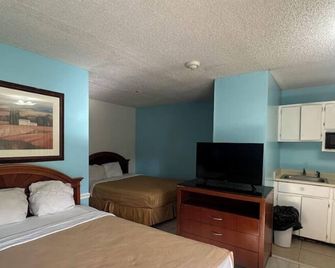 Guest Cottages & Suites, Brunswick Ga - ברנסוויק - חדר שינה