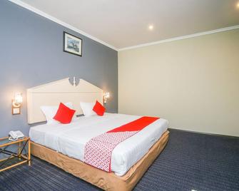 OYO 563 Jockey Lodge Hotel - Sandakan - Ložnice