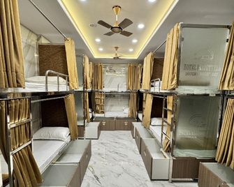 Hotel Elliott Inn - Mumbai - Slaapkamer