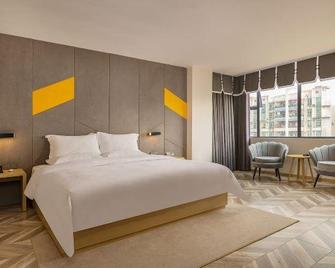 Dewenjia Huajing Hotel (Guangzhou Huaguoshan Park Subway Station Branch) - Cantão - Quarto