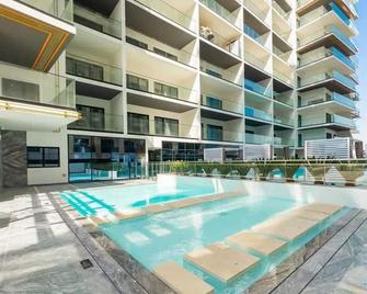 Slick 1BR at Binghatti Creek Al Jadaf by Deluxe Holiday Homes - Dubai - Pool