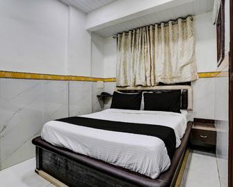 Hotel O Shree Sai Residency - Mumbai - Bedroom