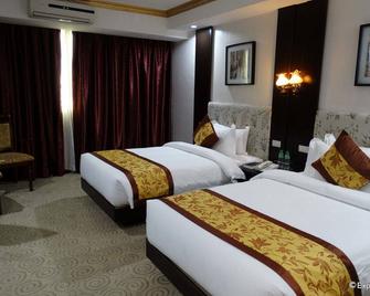 Lido De Paris Hotel - Manila - Phòng ngủ