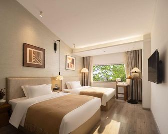 Xijiantang Art Hotel (Jingdezhen Yuyao Jingxiang) - Jingdezhen - Habitació