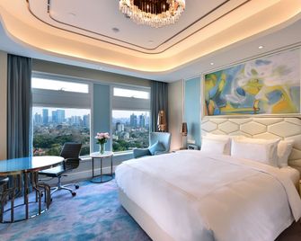 Radisson Blu Plaza Xing Guo Hotel Shanghai - Shanghai - Schlafzimmer