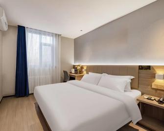 7 Days Premium Baoding Zhuozhou Cultural Square - Langfang - Slaapkamer