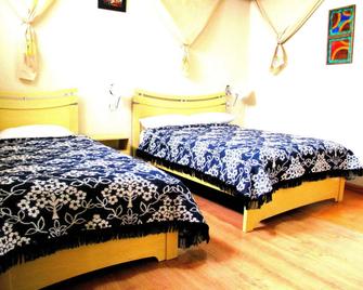 Hotel 4 Rios - Cuenca - Schlafzimmer