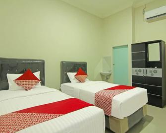 Utama Residence - Паданг - Спальня