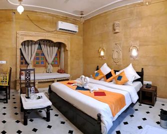 Wonbin Safari Hotel - Jaisalmer - Schlafzimmer