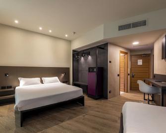 هوتل ديجلي أركيمبولدي - ميلان - غرفة نوم