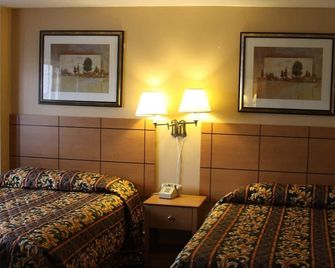 New Relax Inn - Bridgeview - Bedroom
