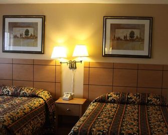 نيو ريلاكس إن - بريدغيفييو - غرفة نوم