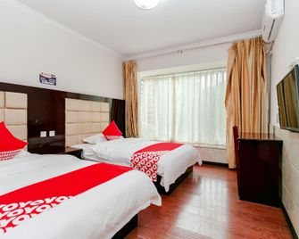 Shunli Tree Business Hotel - Leshan - Habitación