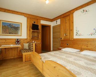 Garni Miravalle - מואנה - חדר שינה