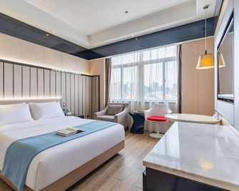 Tianci Hotel (Jiangsu Nanshan Park Xinzhi Hotel) - Jiujiang - Habitación