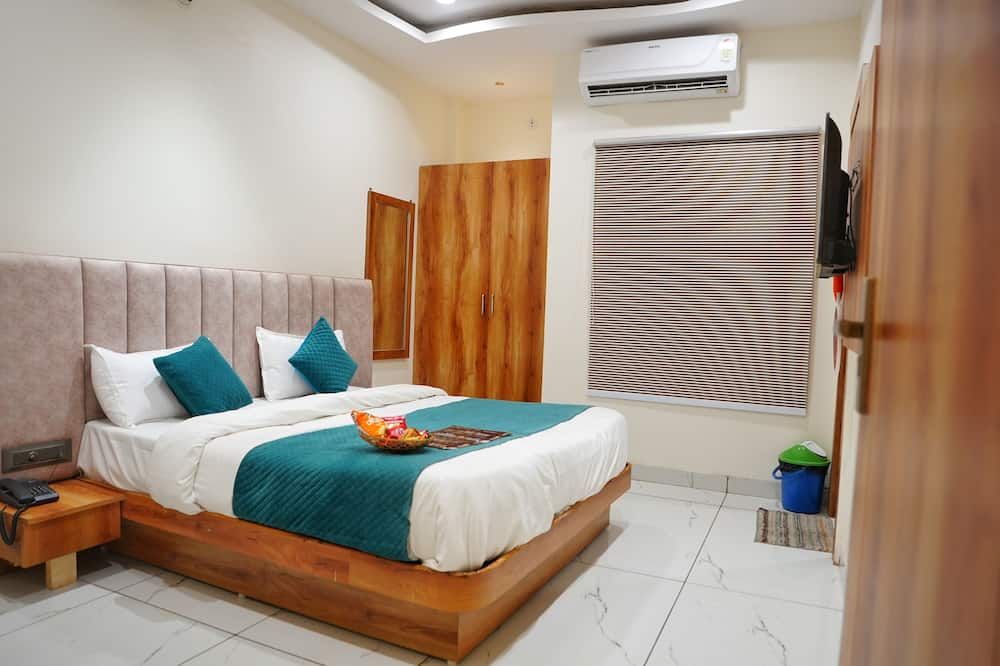 هوتل فينزا فيجاي ناجار - اندور - غرفة نوم