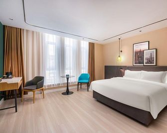 Country Inn & Suites by Radisson Turpan Putaogou Scenic Spot - Turfán - Habitación