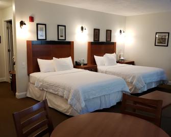 Crescent Suites Hotel - Waltham - Schlafzimmer
