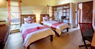 Cocotinos Manado - Manado - Yatak Odası