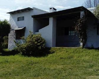 house with two bedrooms for 5/6 people located in the hill of the bull, garage - Piriápolis - Vista del exterior