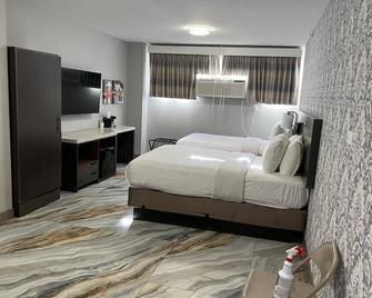 The Essence Hotel At Jfk - Queens - Bedroom