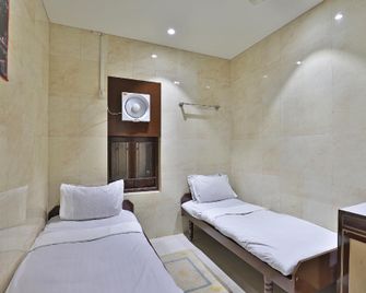 Spot On 48390 Hotel Satkar - Somnāth - Habitación