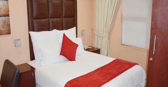 Cozy Nest Guest House - Durban - Yatak Odası