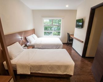 Nagoya Inn Hotel - Kuah - Κρεβατοκάμαρα