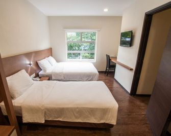 Nagoya Inn Hotel - Kuah - Habitación