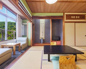 كامينوي هوتل آسو بارك ريزورت - أسو - غرفة معيشة