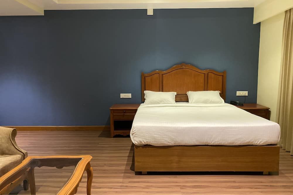 Hotel Glanton Manor - אוטי - חדר שינה
