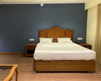 Hotel Glanton Manor - אוטי - חדר שינה