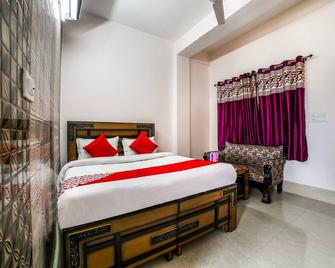 Hotel O Kalindi - Vikāsnagar - Bedroom