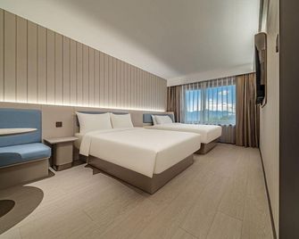 Hanting Hotel (Gonghe Huanghe South Street) - Hainan - Habitación