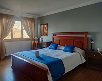Sá Hotel - Cuenca - Bedroom
