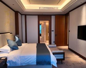 Yancheng Guest Hotel - Yancheng - Bedroom