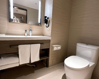 Hanting Express Harbin Railway Station Square - هاربين - غرفة نوم