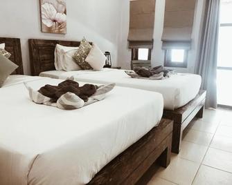 Kalua Boutique Bungalows - Pemenang - Bedroom
