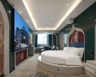 Ezzi Hotel (Wanda Plaza Branch, Ningde High Speed Railway Station) - Ningde - Bedroom
