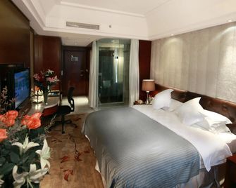 Maison New Century Hotel Wuyuan Haiyan - Jiaxing - Bedroom