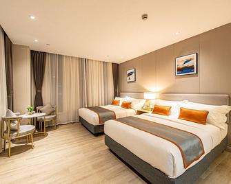 Shanghai Joyful Yard Hotel-Free Shuttle Bus From Pudong Airport And Disneylan - Shanghai - Bedroom