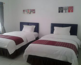 Meuthia Homestay - Sawah Lunto - Bedroom