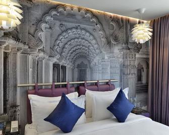 Regenta Central Antarim - אחמדאבאד - חדר שינה